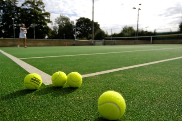 Artificial turf courts offer consistent playing conditions, low maintenance requirements