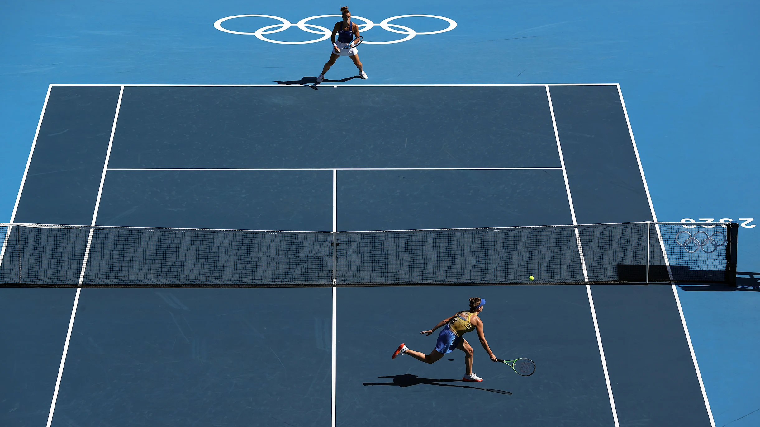 Hard courts provide a medium-paced playing surface