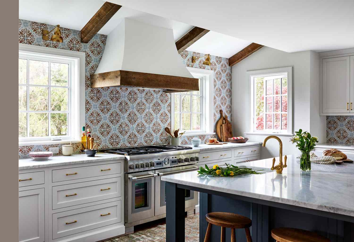 Kitchen backsplashes featuring stone accents elevate the style and visual appeal of kitchen interiors