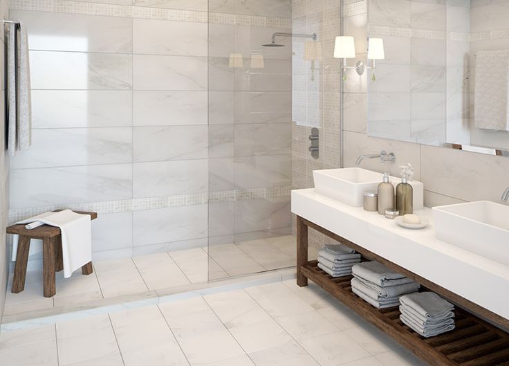 Stone accents on bathroom walls and floors introduce tactile and visual appeal, adding texture